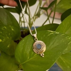 Solid silver casting pendant with blue topaz stone