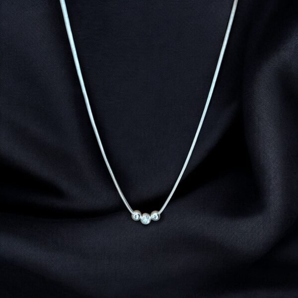 Chain necklace with designed beads