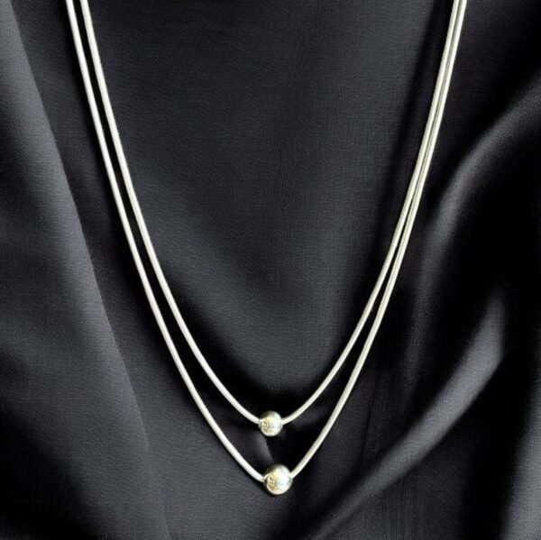 Layered necklace with silver beads
