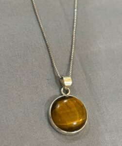 Tiger eye round pendant in 925 silver