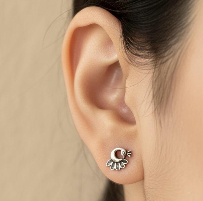 Peacock studs in 925 silver