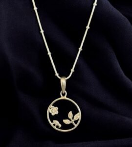 Rainbow Moonstone with leaf and flowers sterling silver pendant