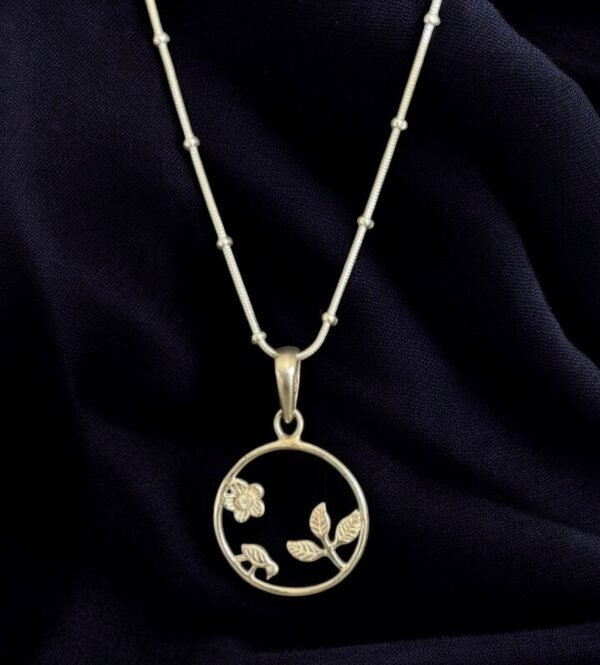 Rainbow Moonstone with leaf and flowers sterling silver pendant