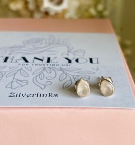 Drop shaped rainbow studs - 925 silver