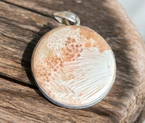 Pink petalite round shaped stone pendant