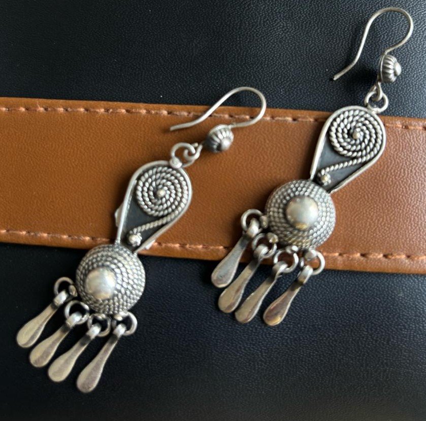 Oxidized silver drop earrings.