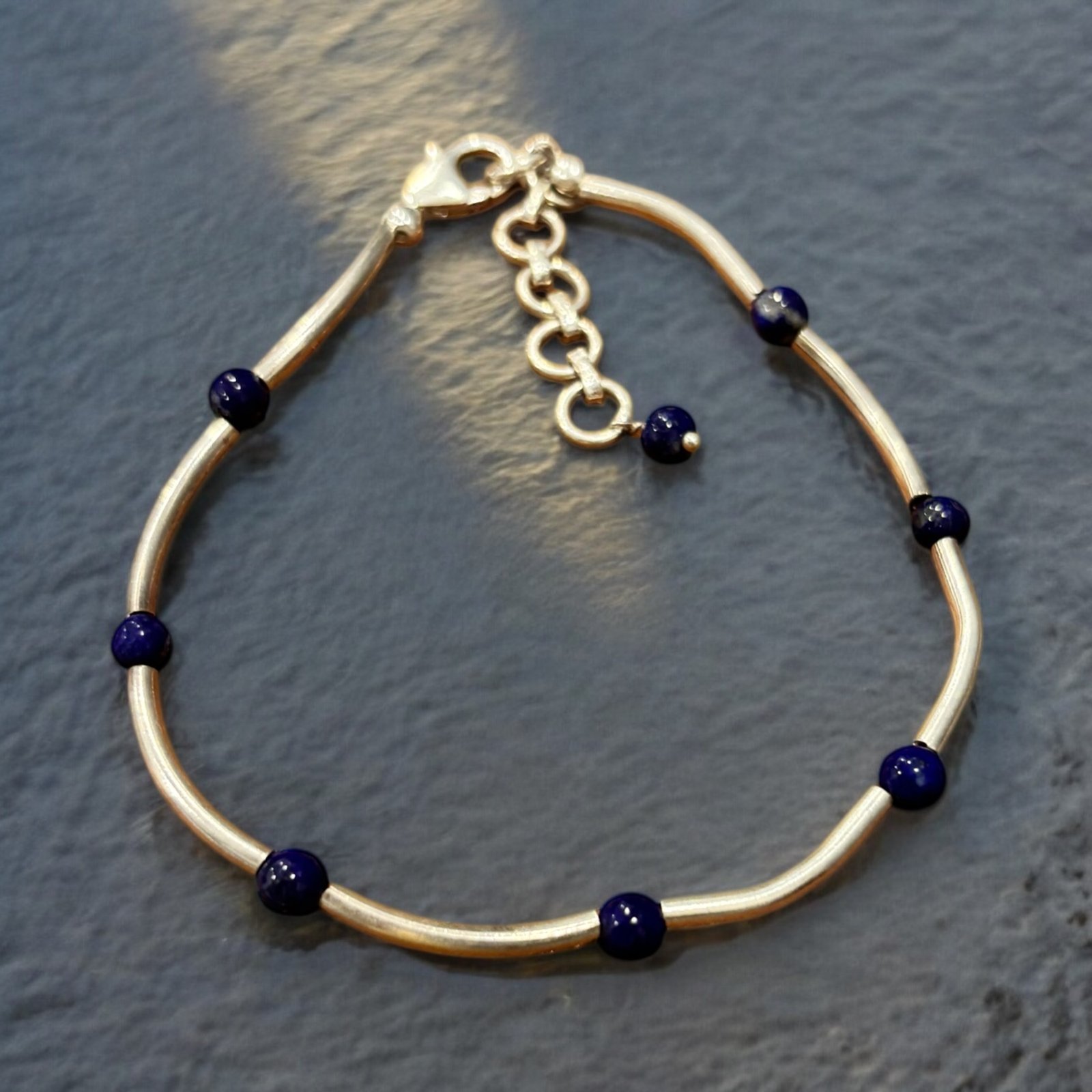 Amethyst beads in silver chain bracelet