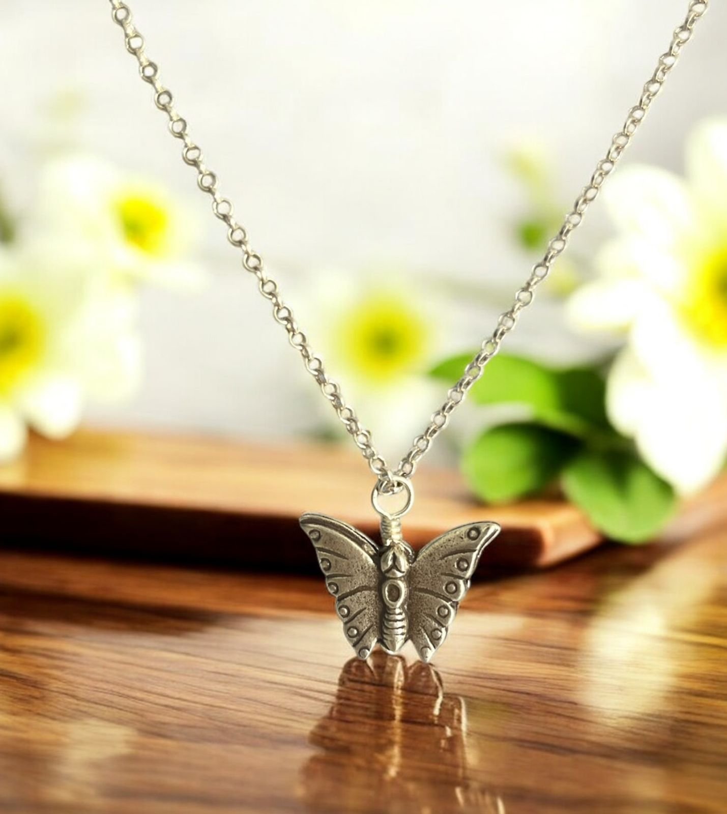 Antique silver butterfly charm necklace