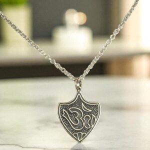 Oxidized silver om shield pendant necklace