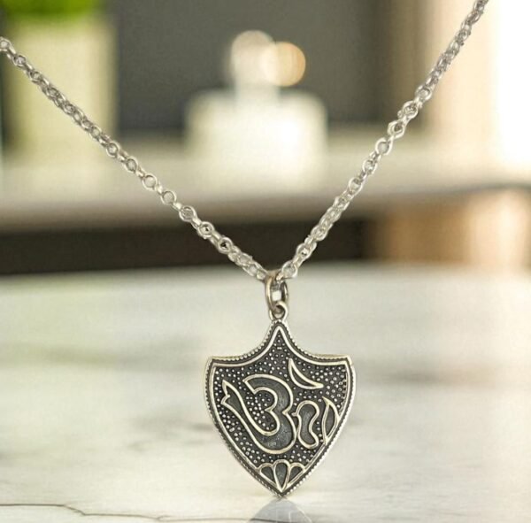 Oxidized silver om shield pendant necklace