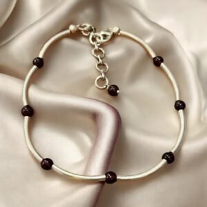 Garnet beads in silver chain bracelet