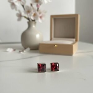 Garnet Red princess cut studs in 925 silver
